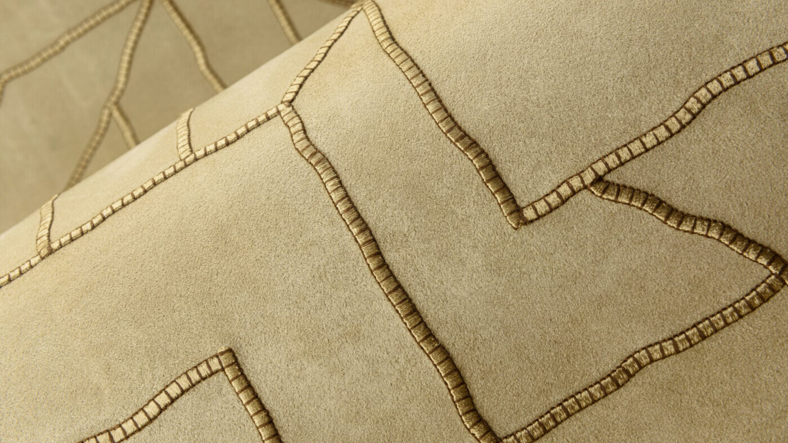 Arte ‘La Dérivée’ embroidered suede-look wallpaper in Truffle (58502) — stitched motif detail