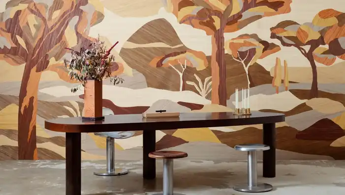 Designer orange wallpaper in an artistic warm-toned interior