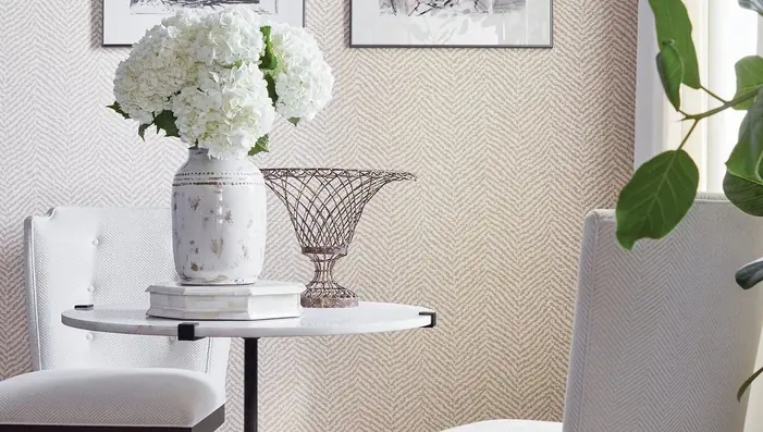Luxury Herringbone Cream Wallpaper in a living room setting.
