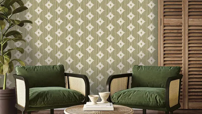 Green and white motif wallpaper with a repeating geometric pattern in a living room