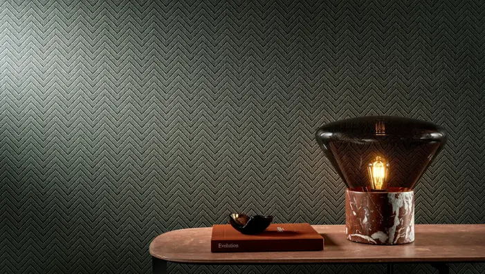 Dark green Arte Amaranth textured chevron wallpaper in a contemporary interior