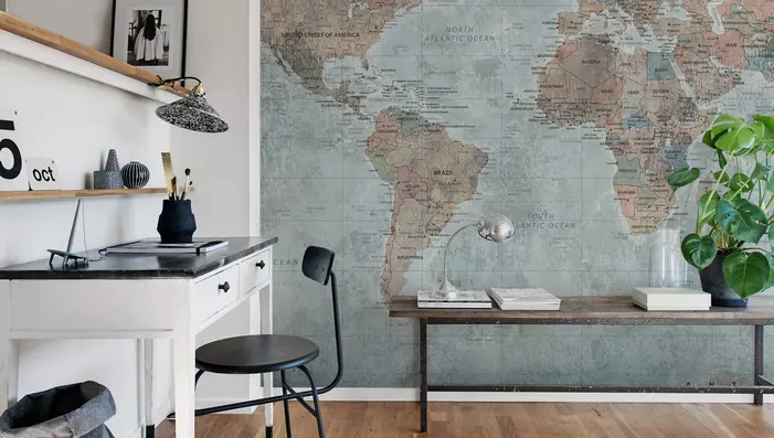 Vintage world map wallpaper mural in a contemporary home office