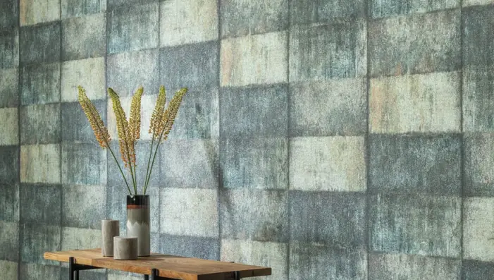 Teal and mineral-toned Omexco glass bead wallpaper in a contemporary interior