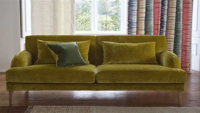 velvet upholstered sofa in a contemporary interior