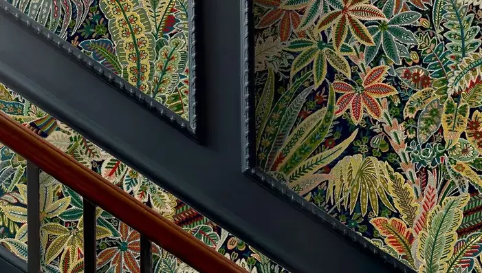 Green Liberty wallpaper in a dining room interior