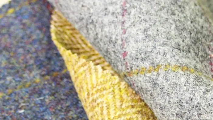 Authentic Sekers Harris Tweed wool fabrics styled in a refined interior setting