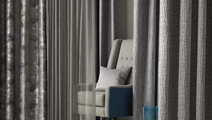 Sekers Yuma drapery fabrics and sheers styled in a luxury hospitality interior