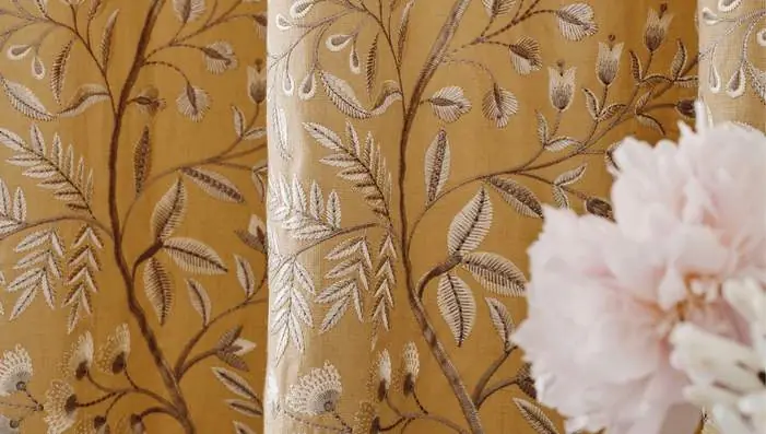 Nina Campbell Dauphine fabrics featuring romantic floral embroidery, ogee patterns and French-inspired botanical stripes