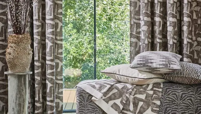 Prestigious Textiles Pioneer fabrics featuring geometric jacquards, textured semi-plains and abstract woven patterns