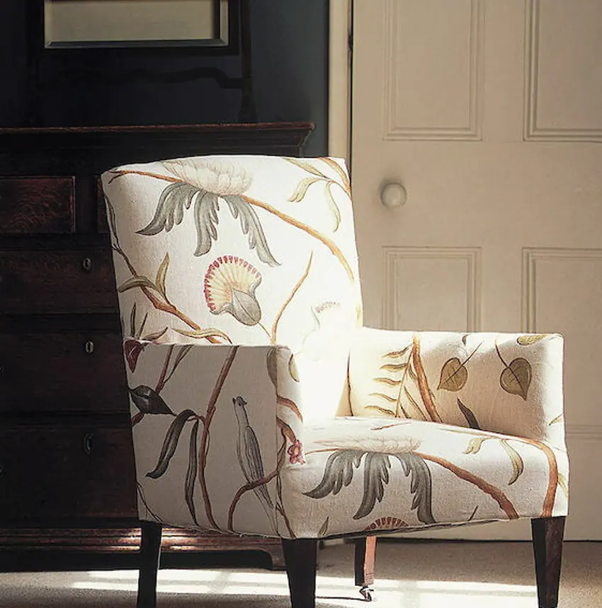 Adam’s Eden bird curtain fabric by Lewis & Wood, showing painterly birds and trailing branches across a linen ground