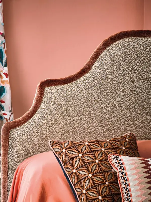 Kitty small-scale leopard animal print fabric by Romo on cushions and upholstery