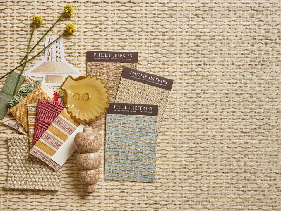 Phillip Jeffries ‘High Tide’ grasscloth wallpaper samples styled on a woven backdrop
