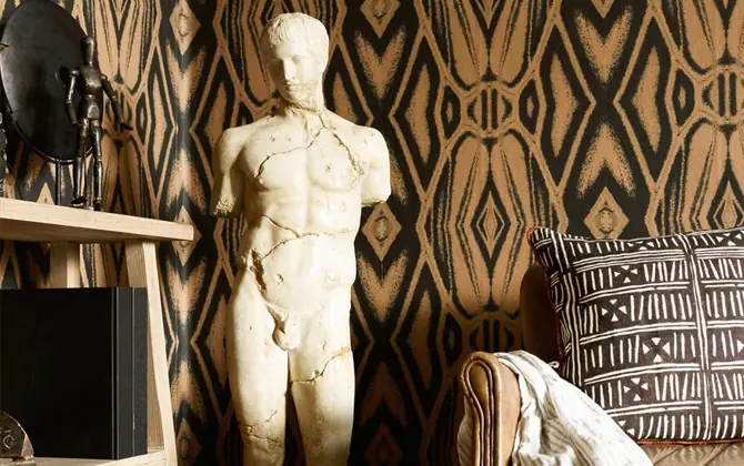 Quagga zebra stripe animal print wallpaper by Mind The Gap behind a console table