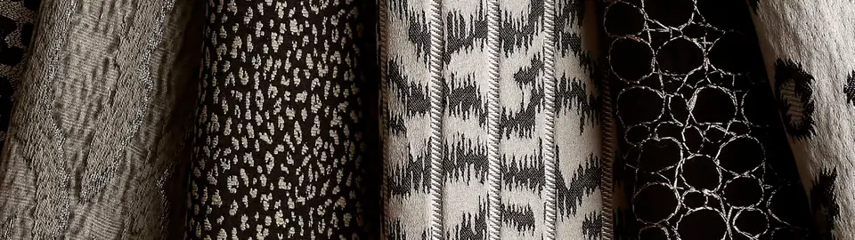 Living room with Sika animal print fabric by Kai on an accent chair