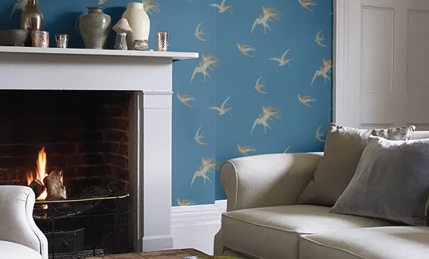 Sanderson Swallows blue bird wallpaper with swifts gliding across a clear sky, ideal for bedrooms and living rooms