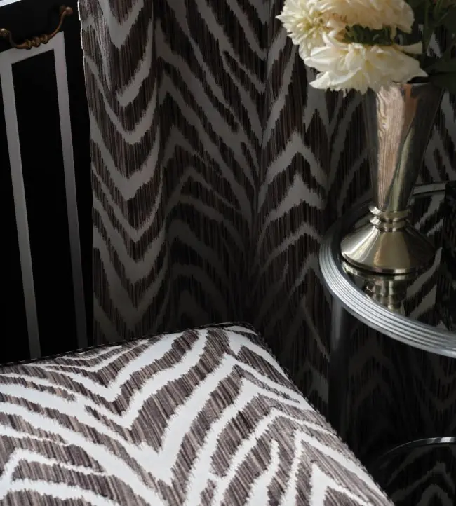 Zebra Strie velvet animal print fabric by Travers on a statement chair
