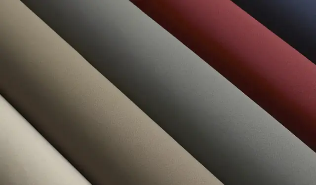 Neutral, grey and red shagreen-effect vinyl upholstery rolls