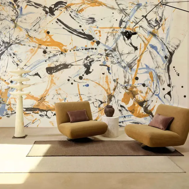 Large-scale abstract designer wallpaper in a modern living room