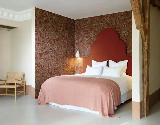 Arte Brocade 97840 Vermilion 126cm wide textile wallpaper in a bedroom