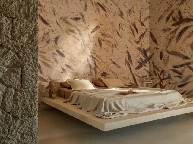 Artistic botanical panoramic wallcovering in a bedroom