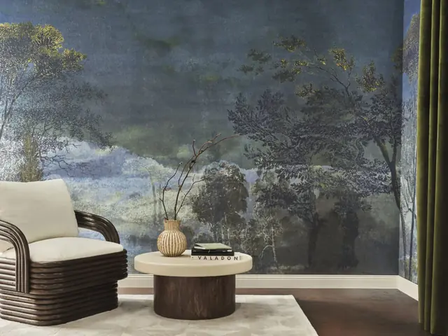 Atmospheric blue forest wallpaper in a contemporary sitting room