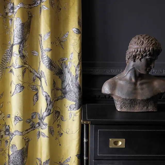 Close view of yellow bird toile curtain fabric