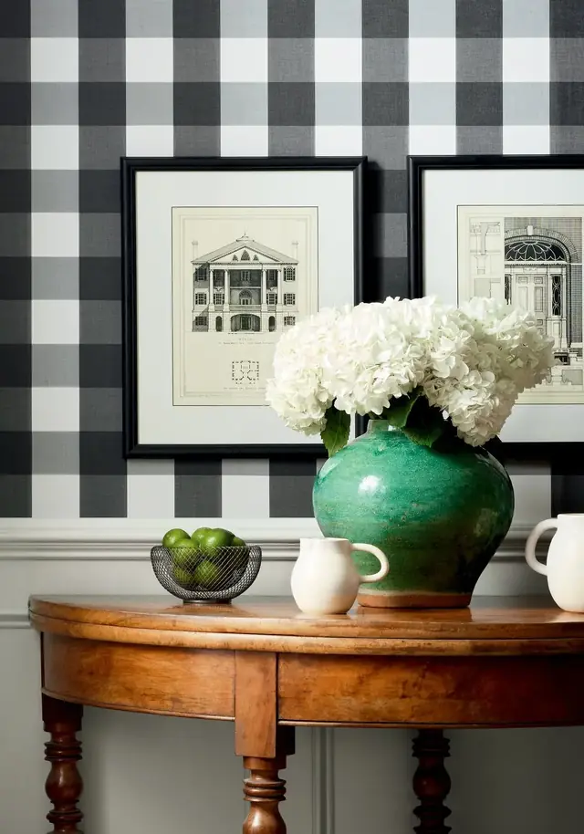 Black and white Thibaut buffalo check wallpaper in a classic interior