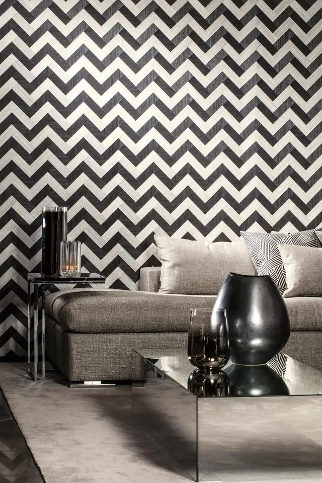Black and white Arte Combine modern chevron wallpaper in a dramatic contemporary interior