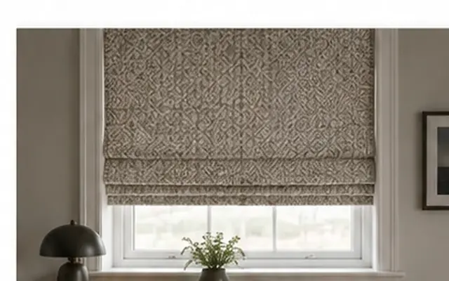 Patterned Roman blind fitted at a bedroom window