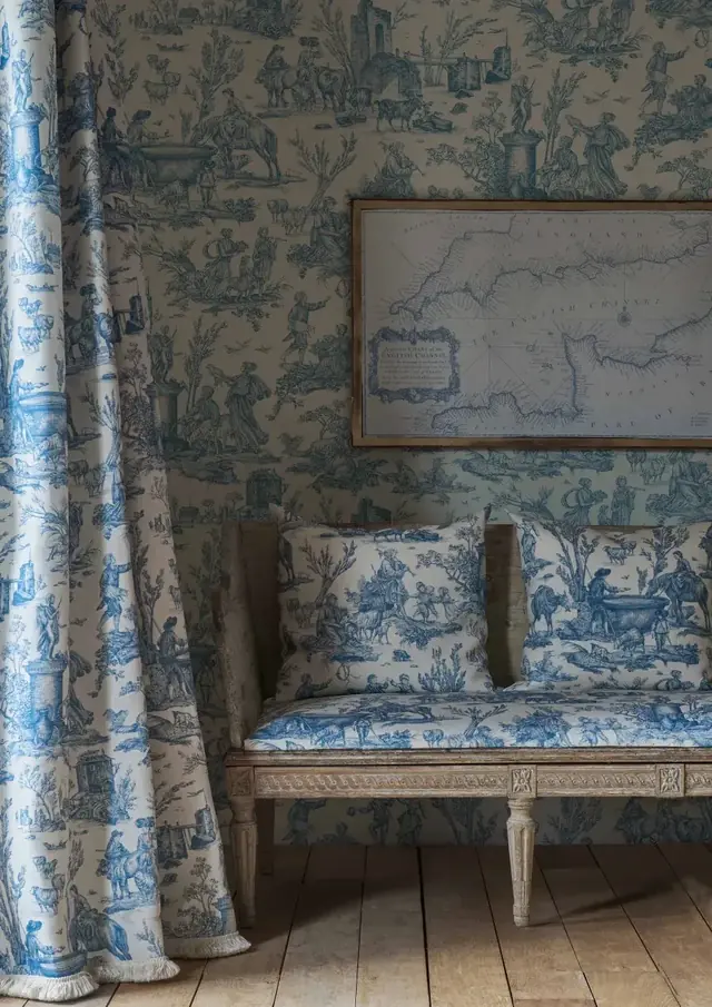 Blue and white Toile Baptiste wallpaper in a traditional living room