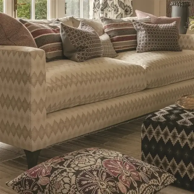 Geometric upholstery displayed across a sofa and coordinating furniture