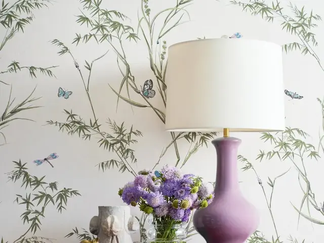 Botanical butterfly wallpaper with bamboo leaves in an elegant interior