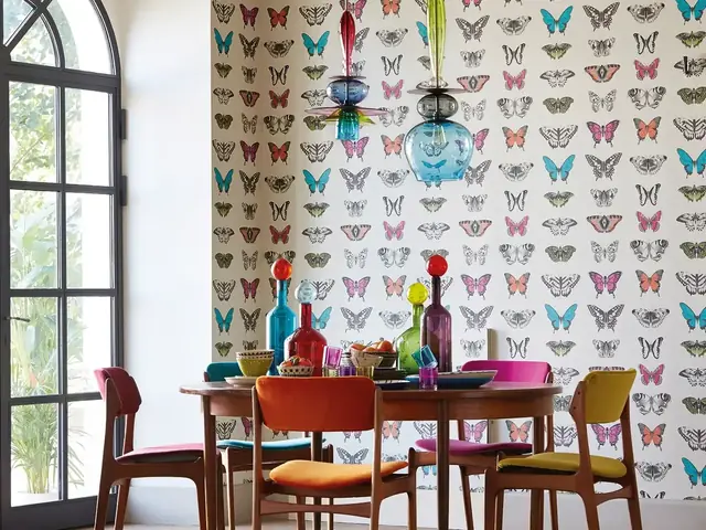 Colourful contemporary butterfly wallpaper in a dining room