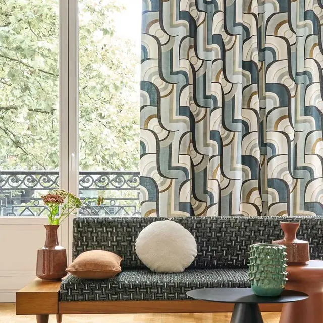 Camengo Chicago large-scale geometric curtain fabric at a full-height window