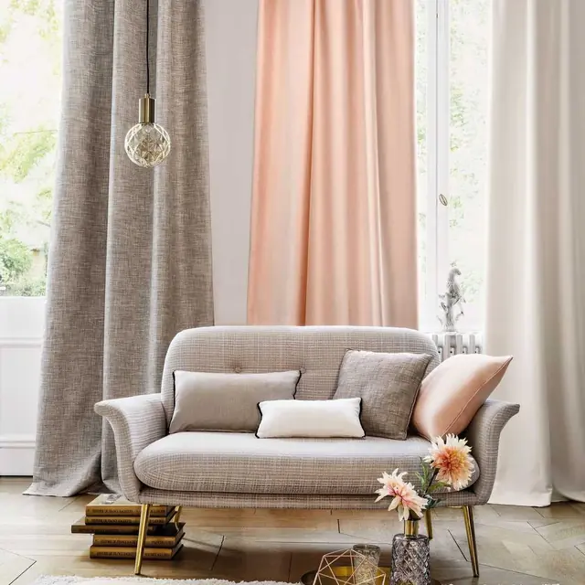 Camengo Esprit plain curtain fabric hanging in soft full-length folds