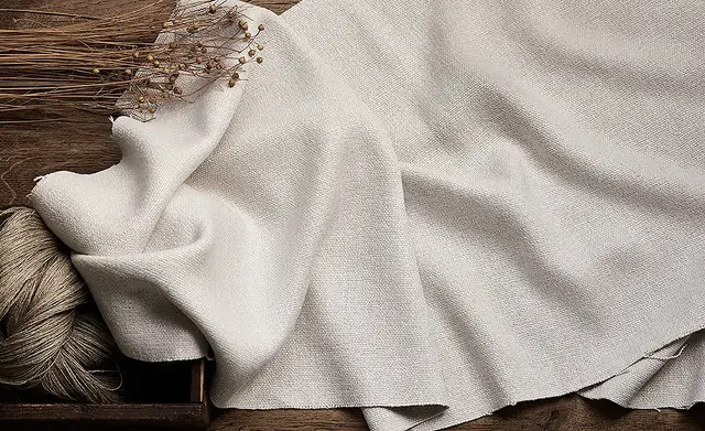 Neutral chenille weave showing its soft raised yarn and drape