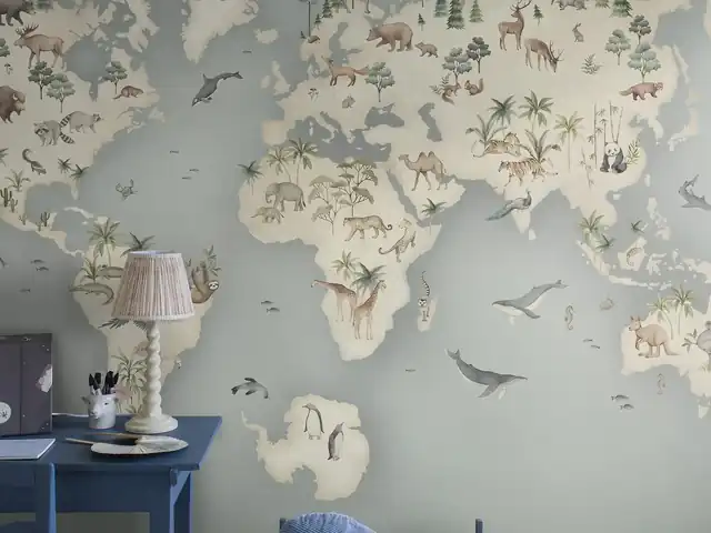 Children’s world map mural decorated with animals from around the globe