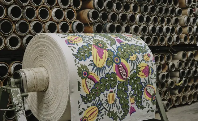 Christopher Farr Cloth printed fabric on a roll at a textile mill