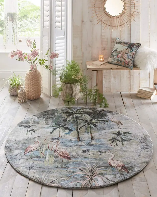 Clarke and Clarke Habitat round rug with botanical and bird design