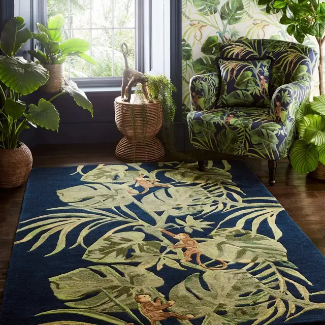 Clarke and Clarke Monkey Business rug coordinated with tropical upholstery and wallpaper