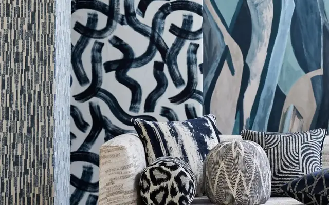 Clarke and Clarke statement wallpapers with patterned upholstery and cushions