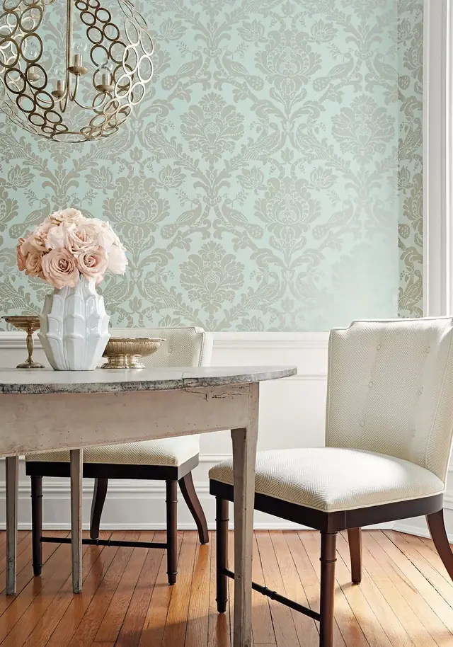Classic pale blue Thibaut Passaro damask wallpaper in an elegant dining room