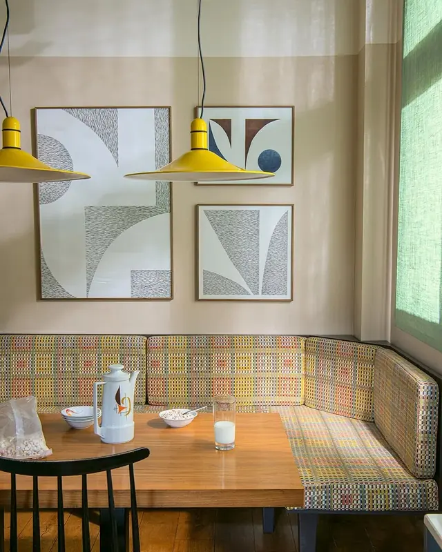 Contemporary dining banquette upholstered in a multicoloured check fabric