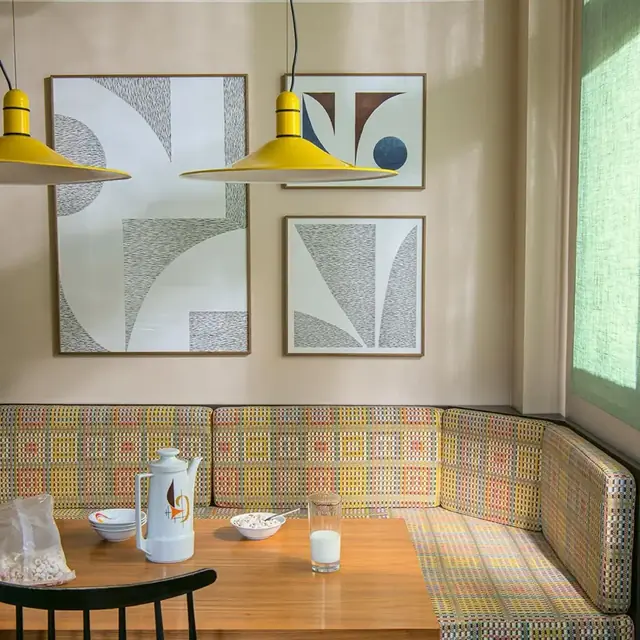 Contemporary multicoloured check upholstery used on fitted banquette seating