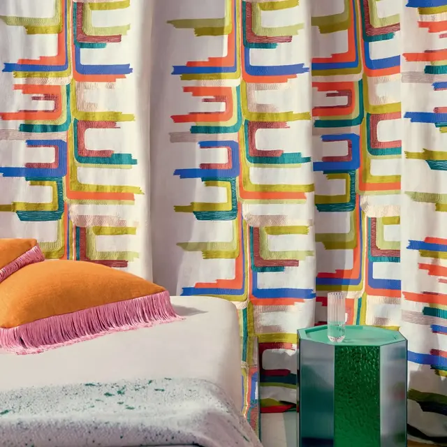 Colourful contemporary geometric embroidered fabric used for curtains
