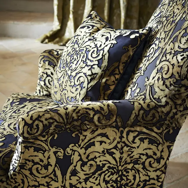 Ornate cut velvet upholstery showing raised pile against a contrasting ground