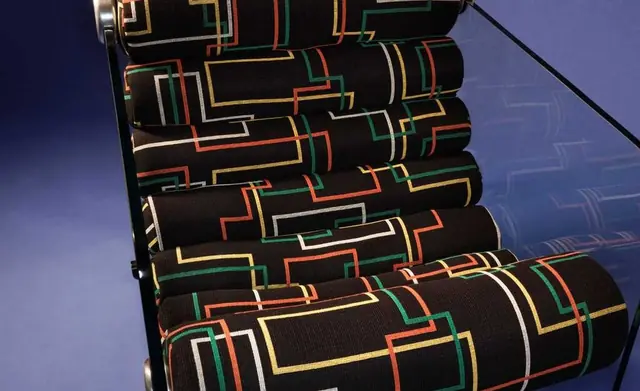 Geometric Dedar fabric upholstered on a contemporary lounge chair