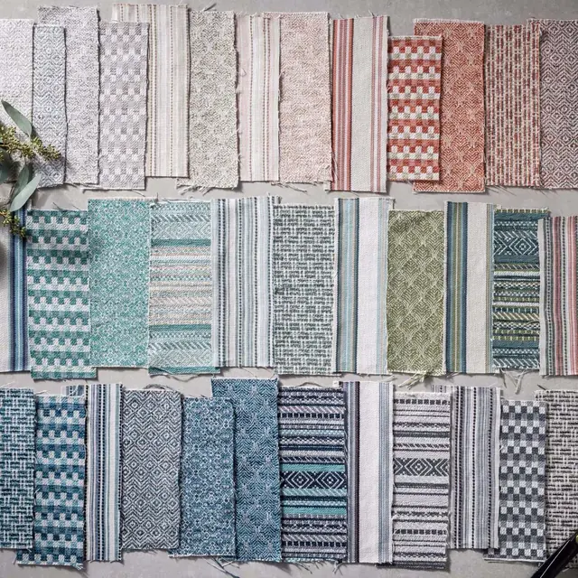 Collection of coordinating patterned and textured fabrics suitable for blinds