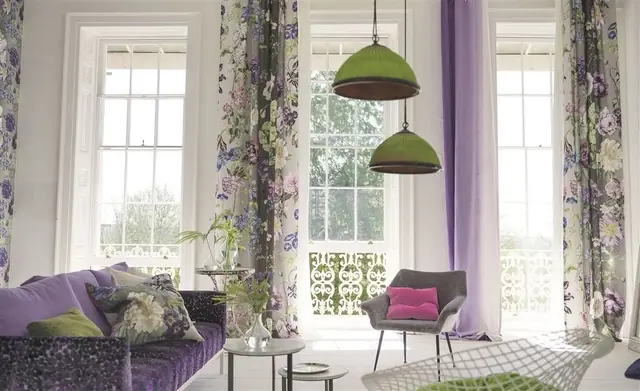 Designers Guild floral curtains in a colourful interior