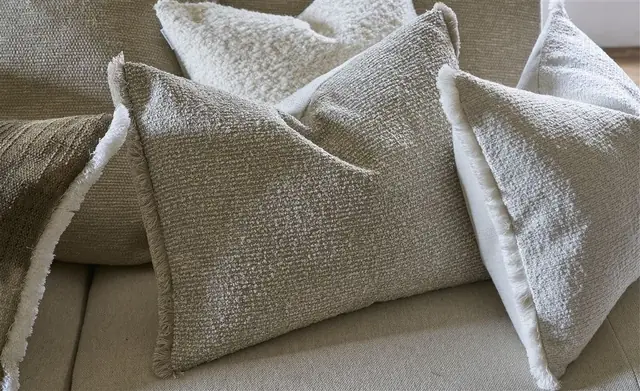 Textured Designers Guild cushions for a bespoke furnishing scheme